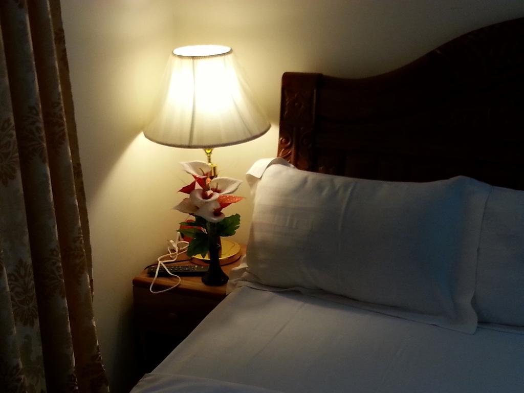 Hotel Magnificat Lomé Zimmer foto